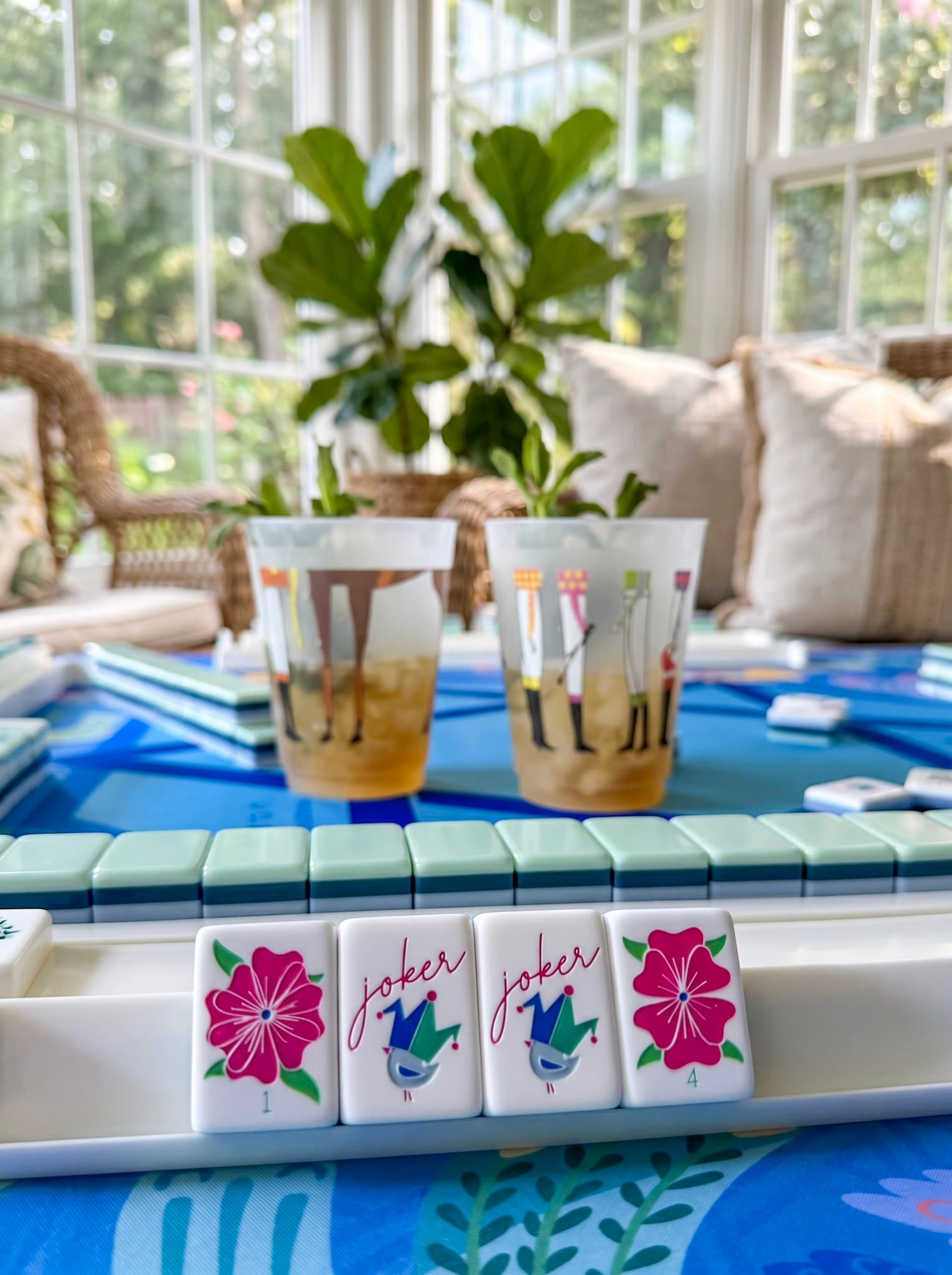 Jokers & Juleps theme — mint juleps and joker tiles on the table